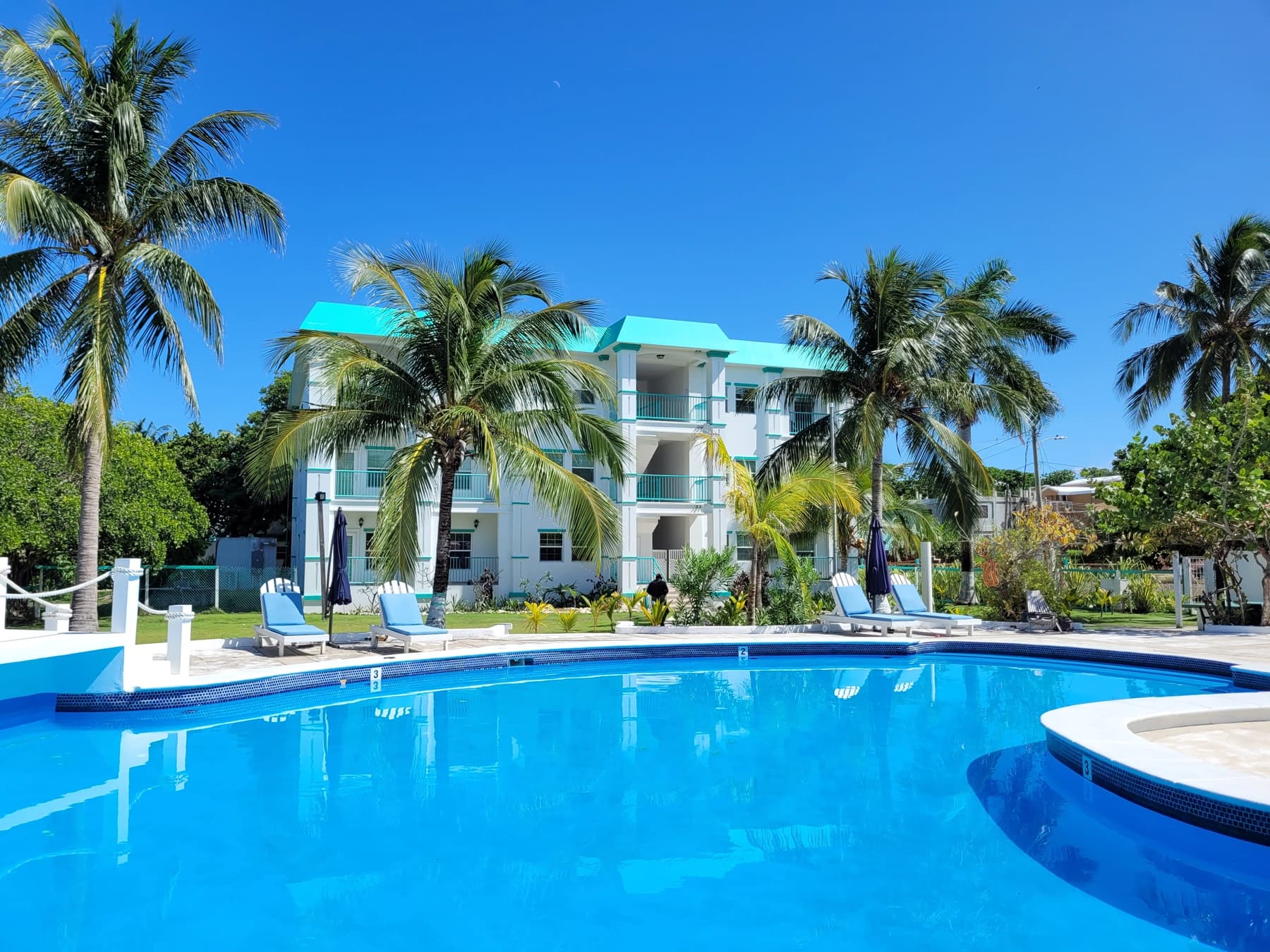 The Belize Marriott Residences seen from the water at sunset